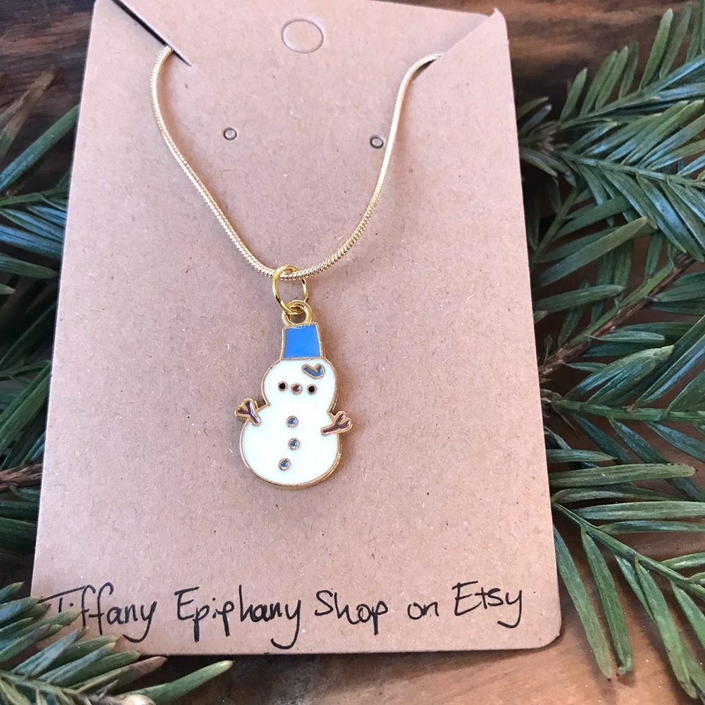 Snowman with blue hat gold necklace